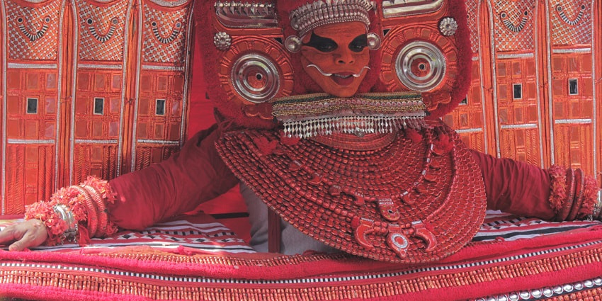 Take a glimpse into Kerala’s spiritual traditions while witnessing Theyyam performance.