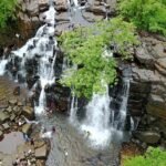 The lush greenery and cascading streams of Murinjapuzha Waterfalls are majestic