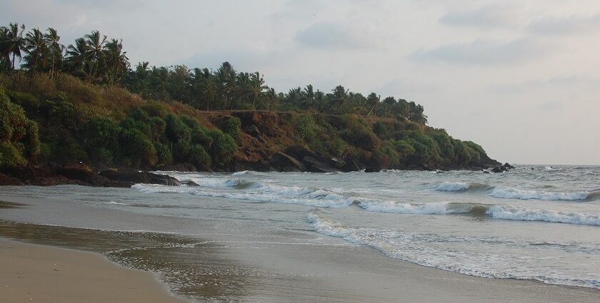 Explore the majestic Malappuram Beach to enjoy its golden sands and azure blue waters