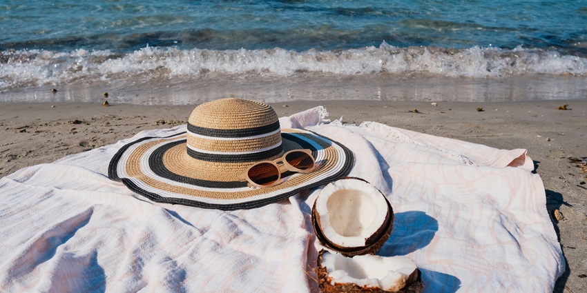 Wear a hat and sunglasses to protect yourself from the sun when visiting Lamiya Bay Beach