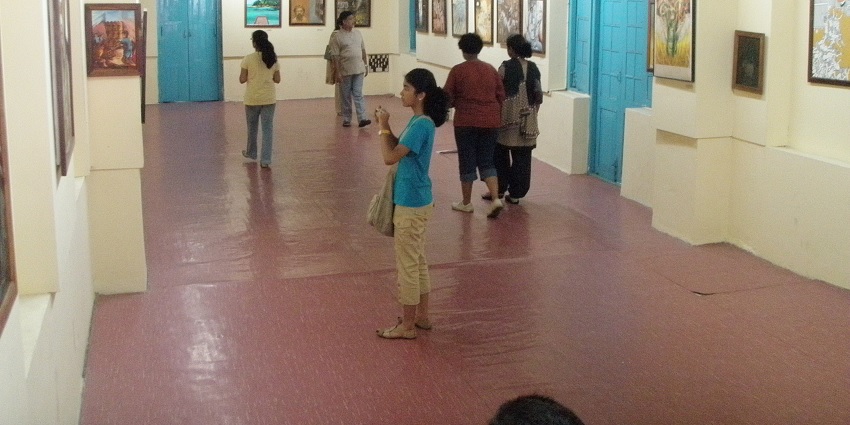 Tourists throng a museum in Port Blair to explore and witness its variety of paintings
