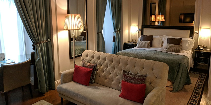 Stay in a comfortable hotel room with warm lighting near this wildlife sanctuary