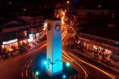 A night view of the tall clock tower in the middle of the Aberdeen Bazaar in Port Blair