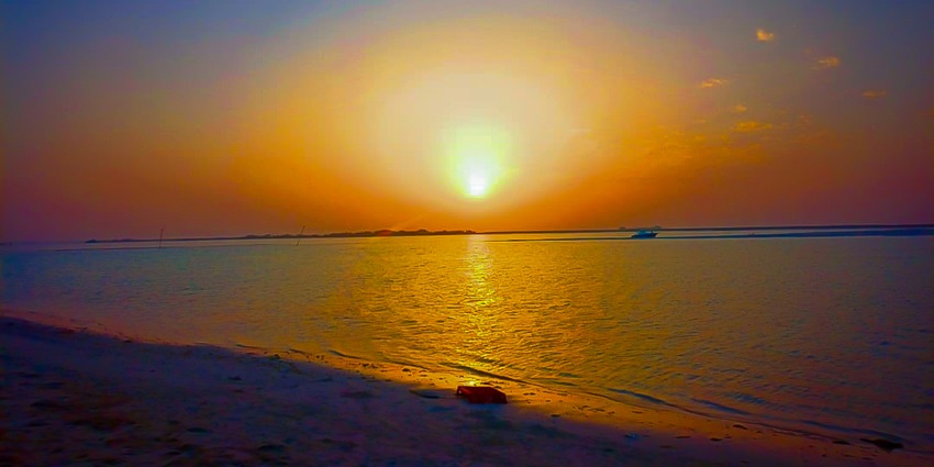 Stunning evening view of Al Bateen Beach, which is a must-visit sight for all travellers.