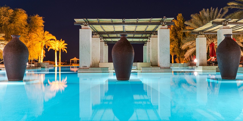 A swimming pool at night