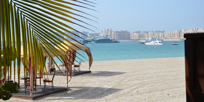 Scenic picture of iconic Black Beach one of the best beaches of Palm Jumeirah