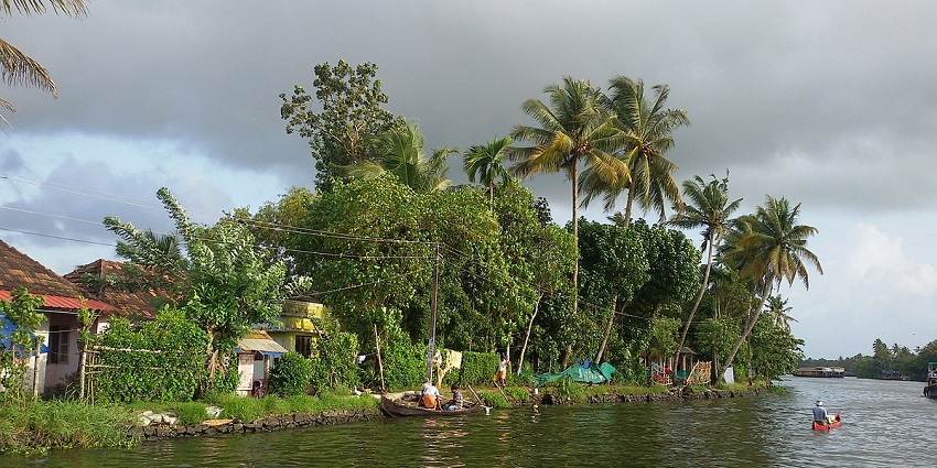 Enjoy a canal ride along the Alleppey Backwaters, a place to visit in November in India