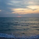 A stunning evening view of a beach in Alleppey, which is a must-visit for all travellers.