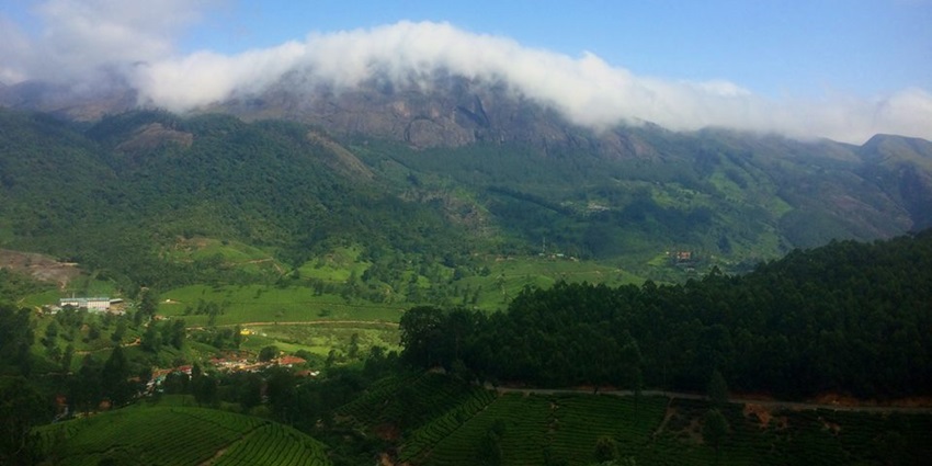 Cloud over the top of Anamudi Peak which is one of the best places to visit in Munnar