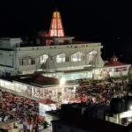 View of pilgrims resting at night outside Ardhkuwari Temple on the trek to Vaishno Devi Temple