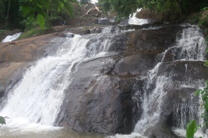 A breathtaking view of a waterfall in Kerala, a must-visit attraction for travellers.