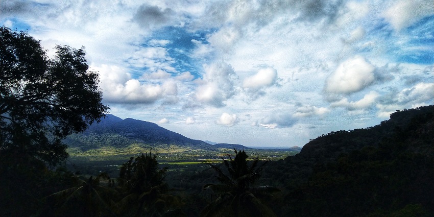Beautiful hill view of Aryankavu, lush green and clear sky - hill stations in Kollam