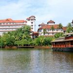 The shimmering waters of Ashtamudi lake are perfect to explore on a houseboat cruise