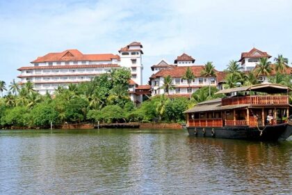 The shimmering waters of Ashtamudi lake are perfect to explore on a houseboat cruise