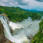 Panoramic view of Athirapally falls, one of the most popular places to visit in Thrissur