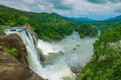 Panoramic view of Athirapally falls, one of the most popular places to visit in Thrissur