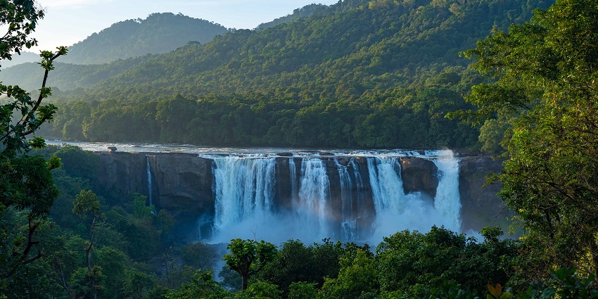 The lushy green forests surrounding the Athirapally Waterfalls after the monsoon rains