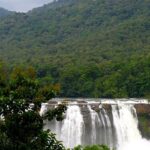 A view of the Athirapally Waterfalls during the monsoon season in Thrissur, Kerala