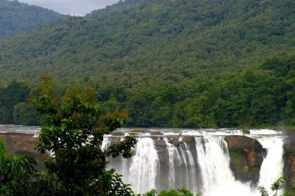 A view of the Athirapally Waterfalls during the monsoon season in Thrissur, Kerala