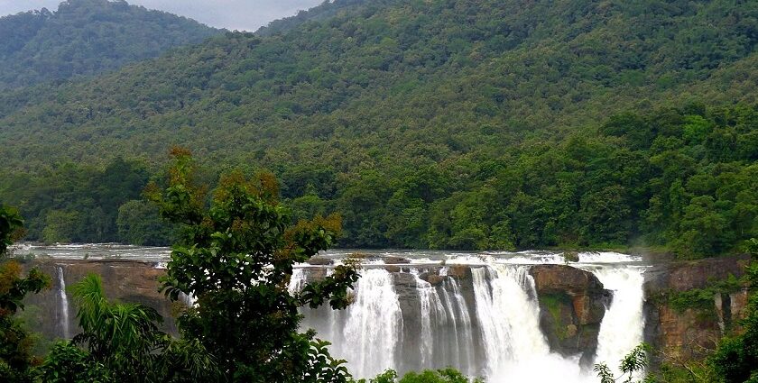 A view of the Athirapally Waterfalls during the monsoon season in Thrissur, Kerala