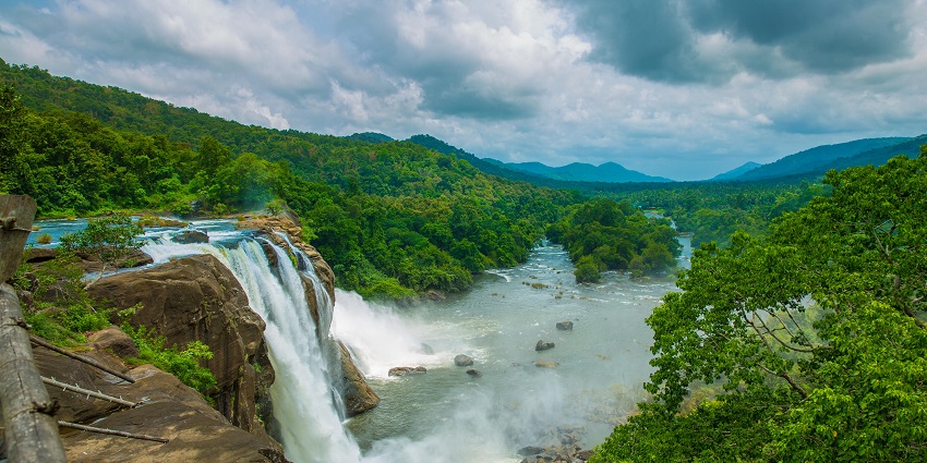 A beautiful scene from the Athirapally waterfalls - best hill stations in Kollam