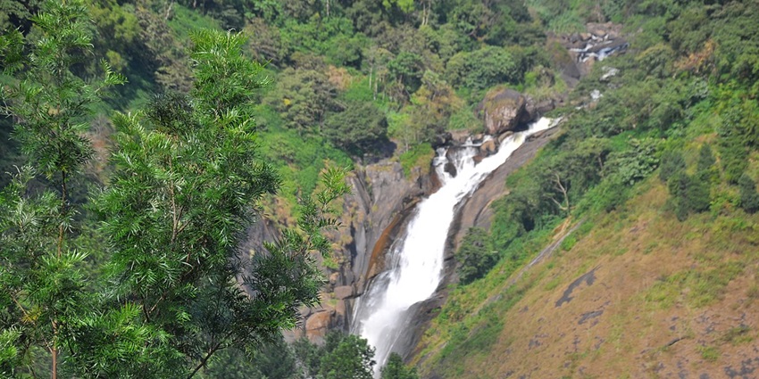 Witness the calm Attukad Waterfalls - one of the places to visit in Munnar with family.