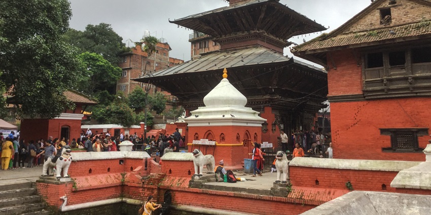 Exploring the intricate architecture of Bagalamukhi Temple, a sacred site, doing rituals.