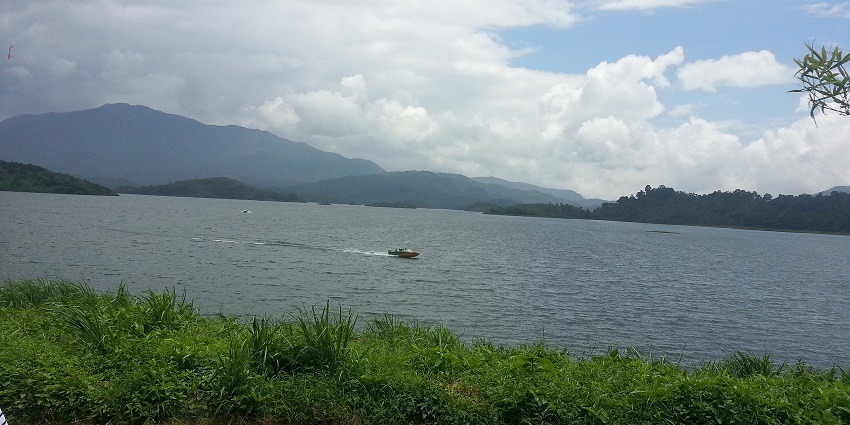 Explore the surreal beauty of Banasura Sagar Dam near Kanthanpara Waterfalls on your trip.