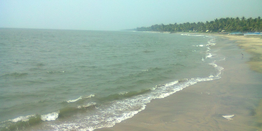 Beypore Beach with its golden sands, calm waves, and historic boat building yard