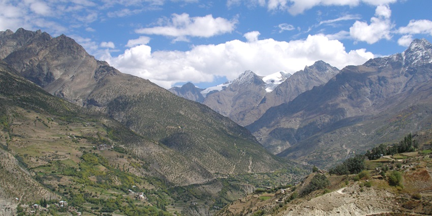Beautiful view of the grand forested Bhaga valley in Lahaul overlooking the hills beyond