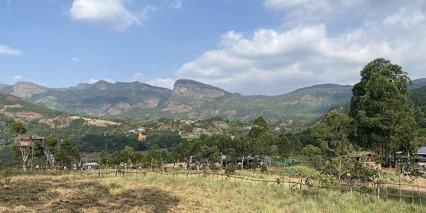 An idyllic view of the Bhramaram View Point featuring majestic peaks and rolling valleys.