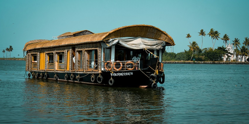 Image of a houseboat around Kerala - Boat Cruises At Padinjarekkara is one of the best things to do