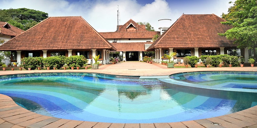 Bolgatty Palace Hotel surrounded by greenery on Bolgatty Island, Kochi, Kerala