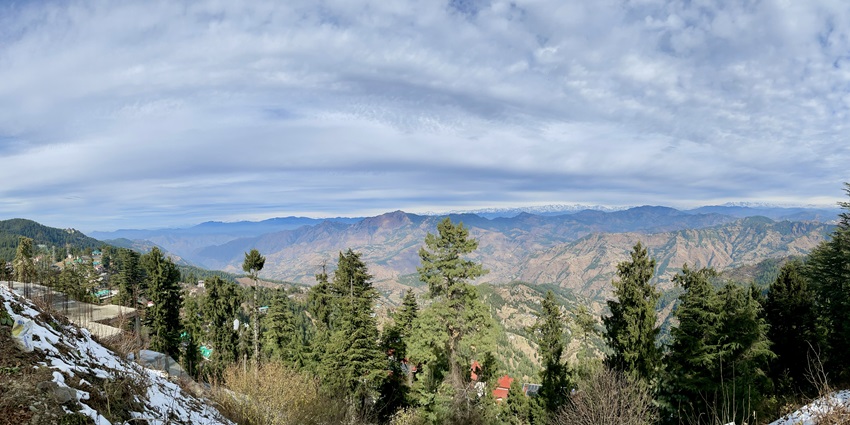 A panoramic view of the vast mountain range of the Himalayas from a hill in Chail