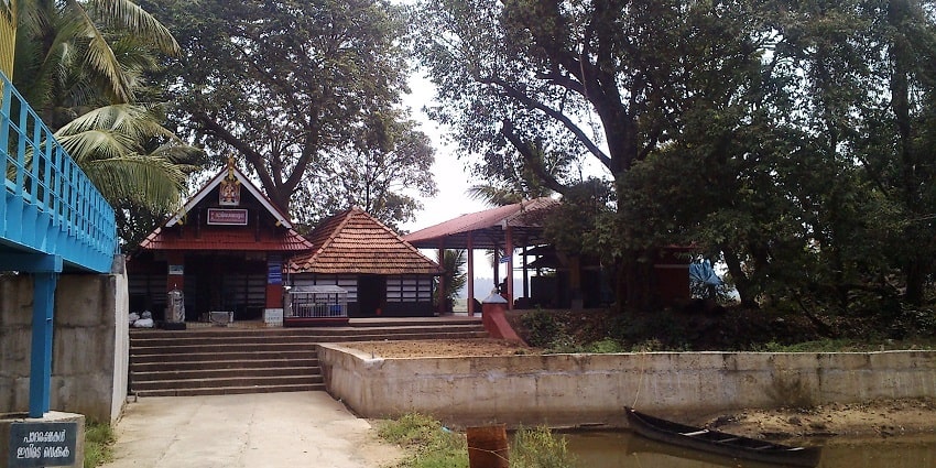 Image of Chamaravattom Ayyappa Temple taken a distance, surrounded by beautiful Trees