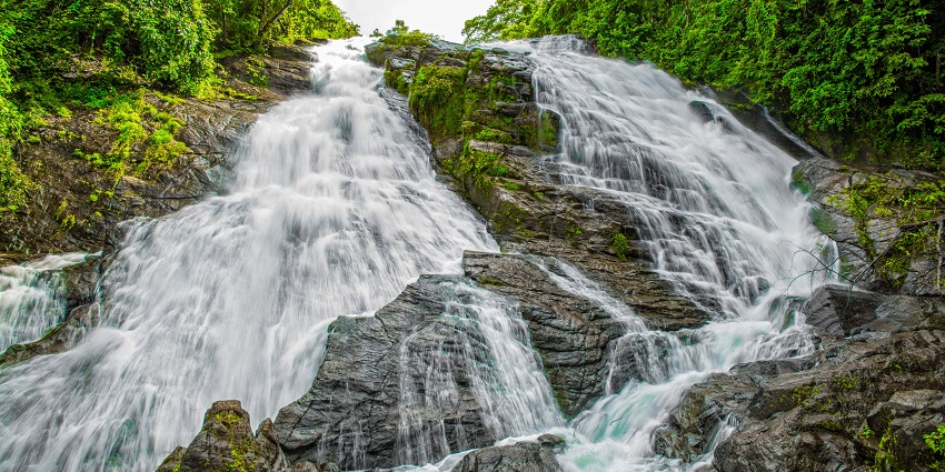 Cherish the awe-inspiring views of Charpa Waterfalls in Athirapally, Kerala, India.