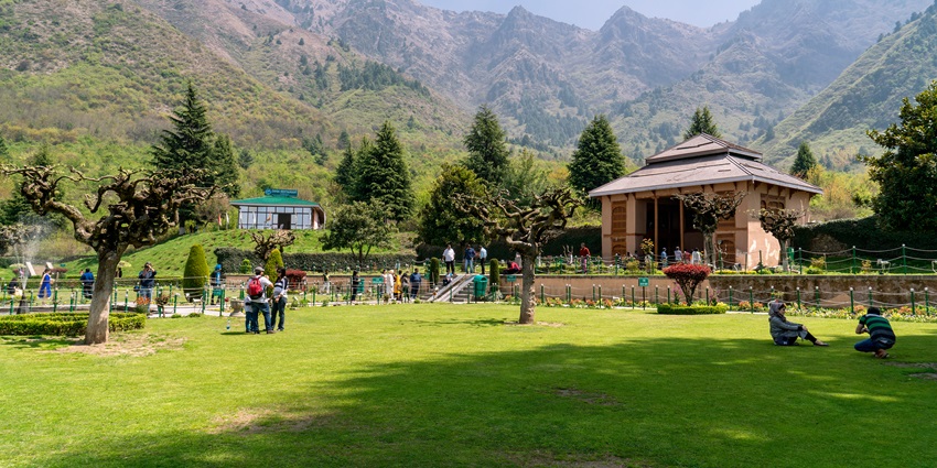 Chasme Shahi amongst the misty clouds is a historical site built during Mughul Era