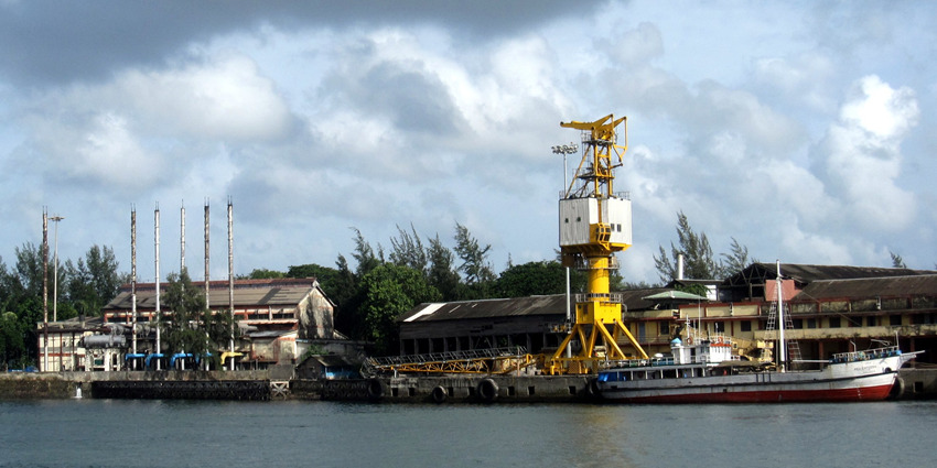 The Chatham Saw Mill in Port Blair with boats resting on its port near Viper Island.