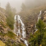 Sceic picture of a waterfall taken from a distance - Chellarkovil Waterfalls in Kerala