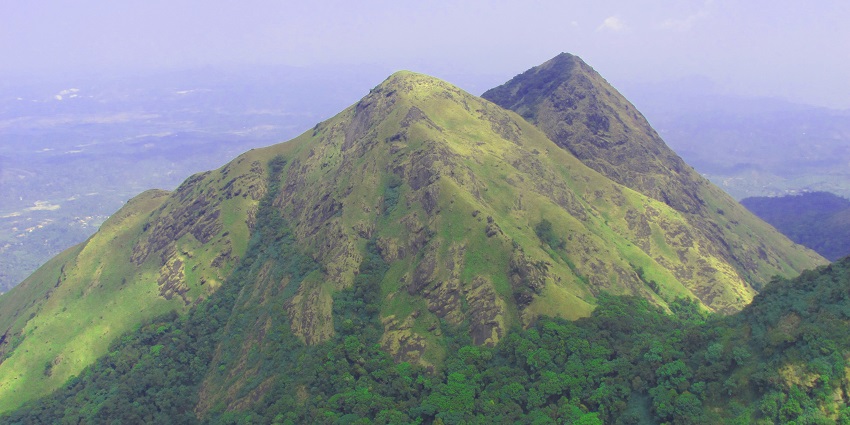Chembra Peak is one of the highest points for paragliding in Wayanad for travellers.