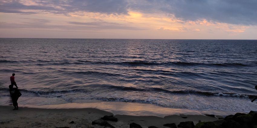 Relax at the serene Cherai Beach, one of the places to visit in Kochi, Kerala, India.
