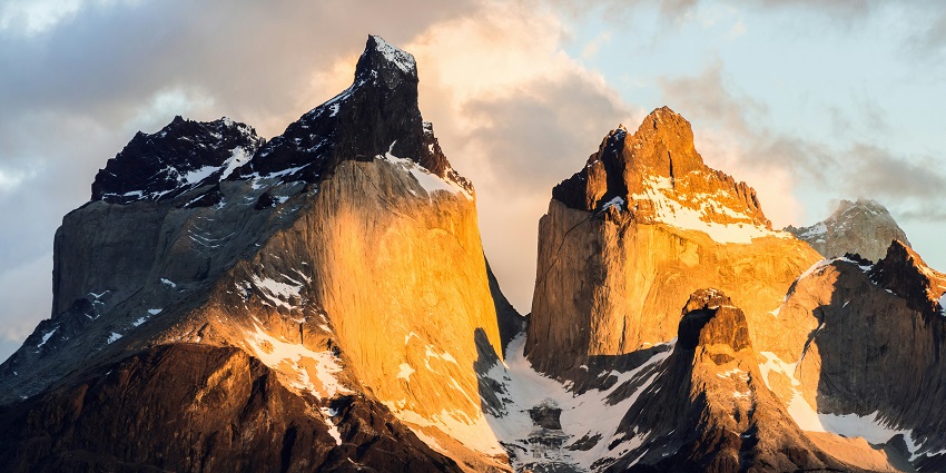 Scenic view of sunlight falling on mountains at Torres del Paine National Park, Chile
