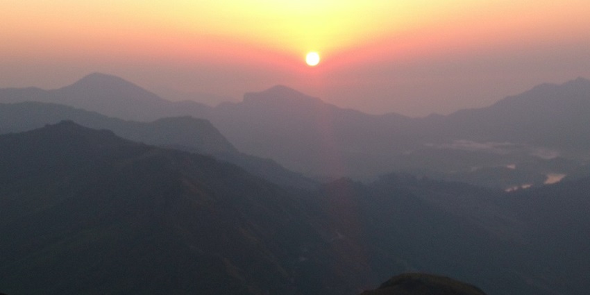 View of Soothing Sunset at Choramudi Peak which is one of the places to visit in Munnar