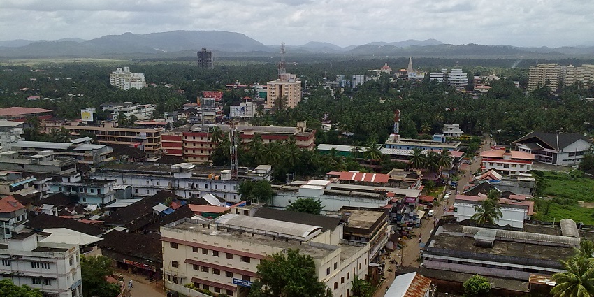 Aerial view of Thrissur city - Covered with lush green trees and beautiful hills