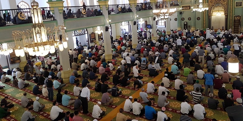 People gathered together at the Sharjah Mosque