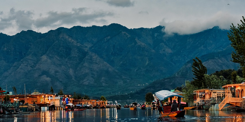 An evening view of the Dal Lake in Srinagar with pristine mountains in the background
