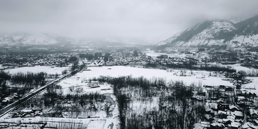Top view of the frozen Dal Lake, one of the best places to visit in Kashmir in February.