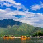 Crystal clear waters of serene Dal Lake, one of the places to visit in Srinagar.