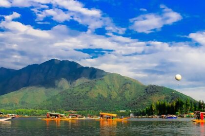 Crystal clear waters of serene Dal Lake, one of the places to visit in Srinagar.