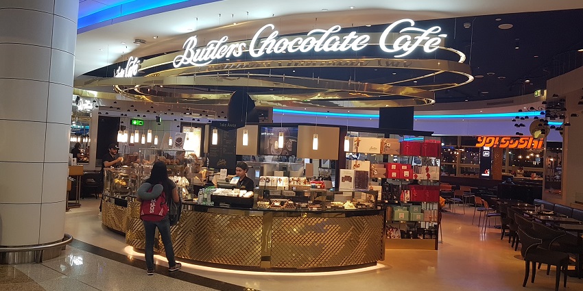 Snapshot of a cafe inside the waiting area at the airport - Things to do in Dubai Airport